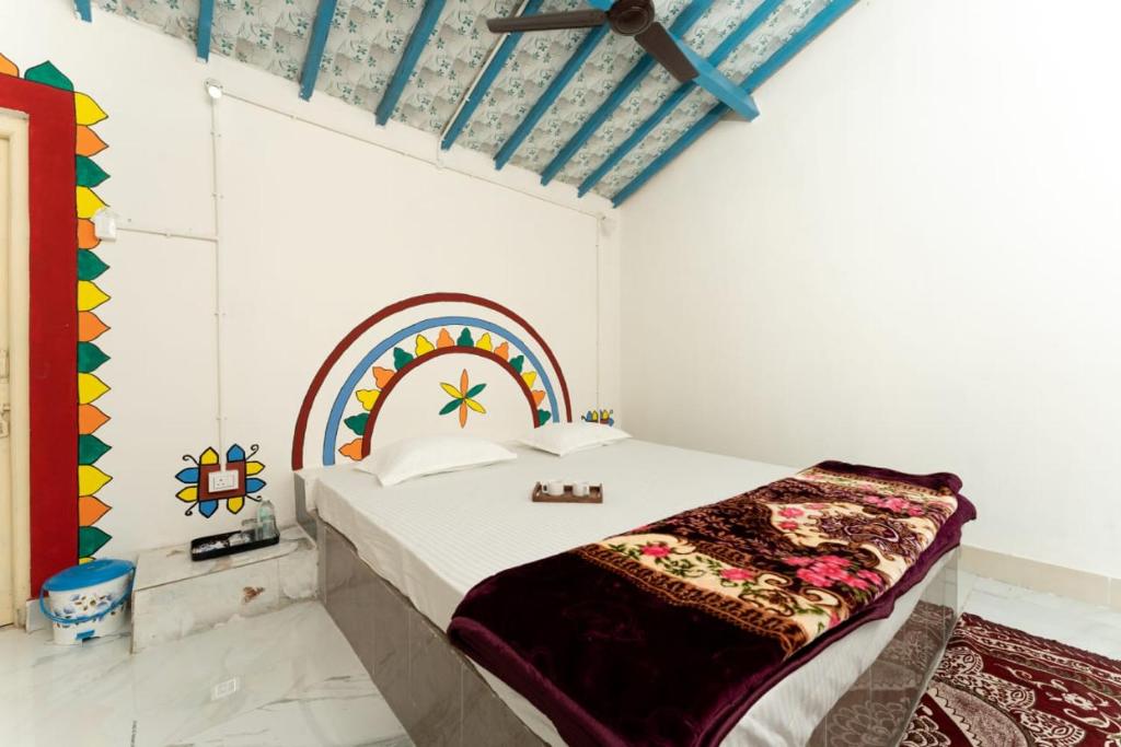 Postel nebo postele na pokoji v ubytování Rann Diamond Village Resort