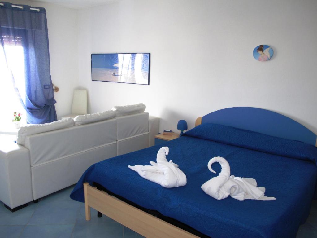 Postel nebo postele na pokoji v ubytování Miramare