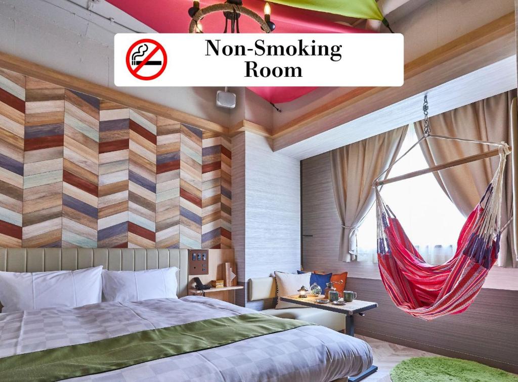 Postel nebo postele na pokoji v ubytování Hotel BaliAn Resort Shinjuku Glamping