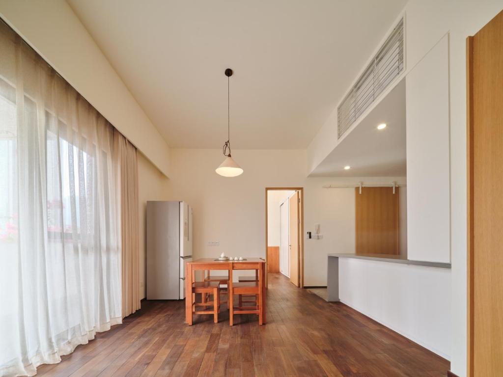 Kuchyň nebo kuchyňský kout v ubytování Wutong Hotel Apartment Bao'an Center