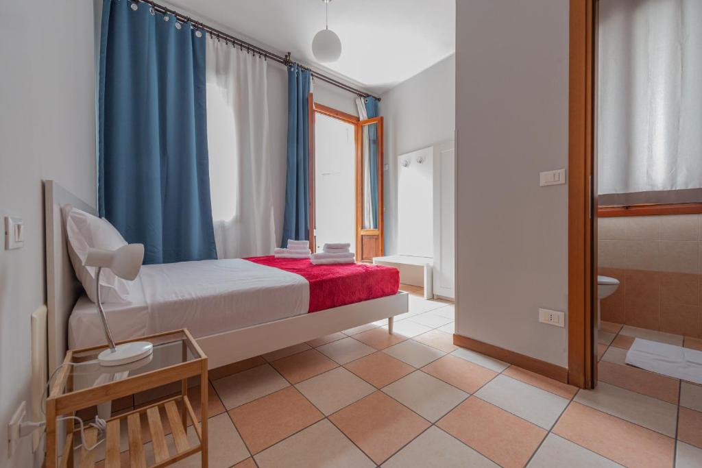 Postel nebo postele na pokoji v ubytování Marconi Lodge