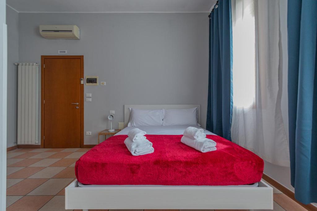 Postel nebo postele na pokoji v ubytování Marconi Lodge