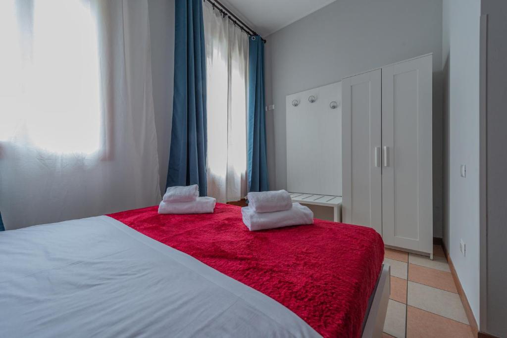 Postel nebo postele na pokoji v ubytování Marconi Lodge