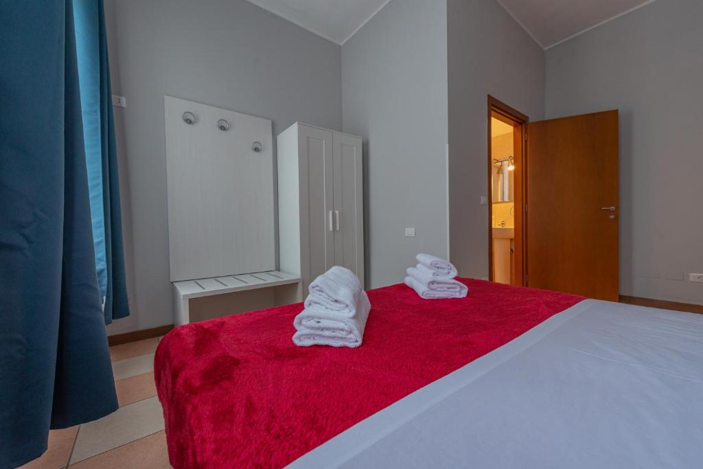 Postel nebo postele na pokoji v ubytování Marconi Lodge