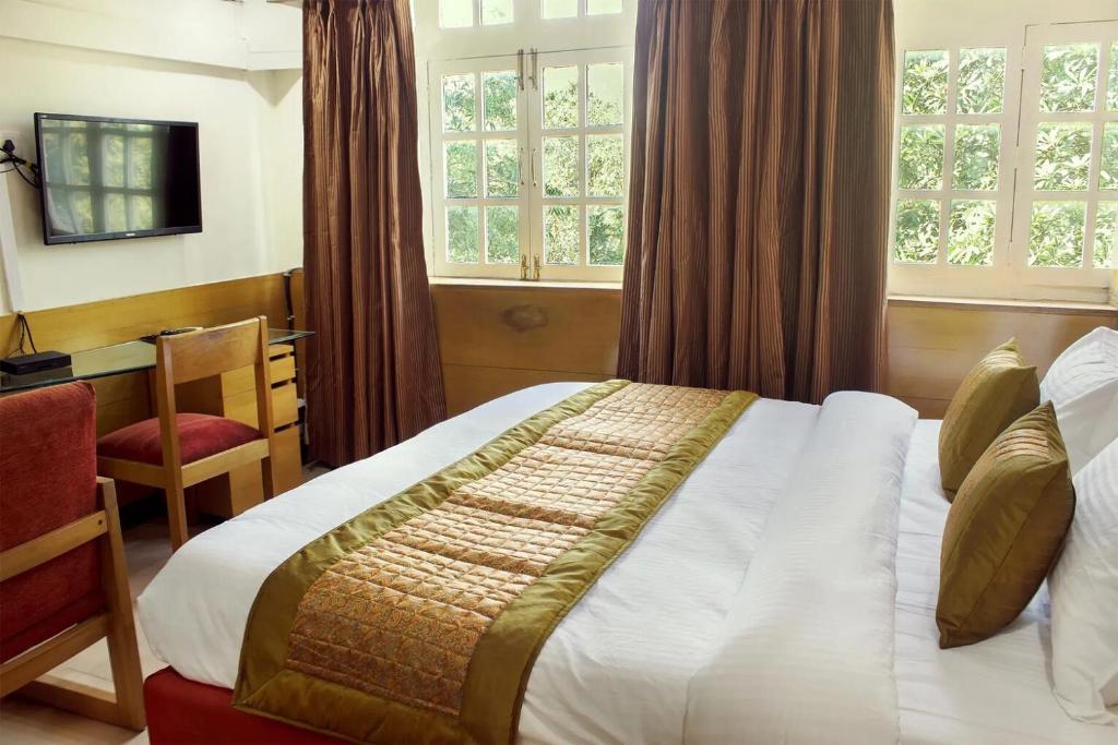Postel nebo postele na pokoji v ubytování Hotels Daffodils