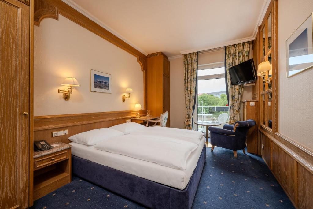 Postel nebo postele na pokoji v ubytování Ringhotel Seehof