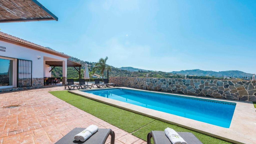 Bazén v ubytování Villa Rosa de Cómpeta Canillas de Albaida by Ruralidays nebo v jeho okolí
