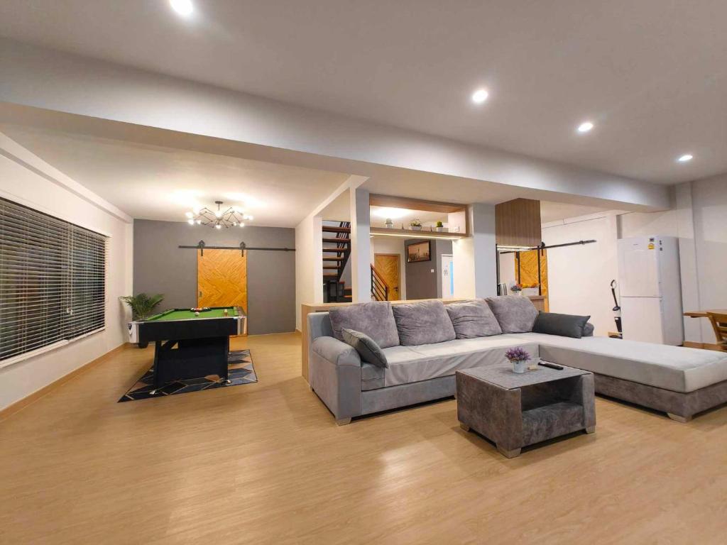 Posezení v ubytování Sawadee Guesthouse Suvarnabhumi