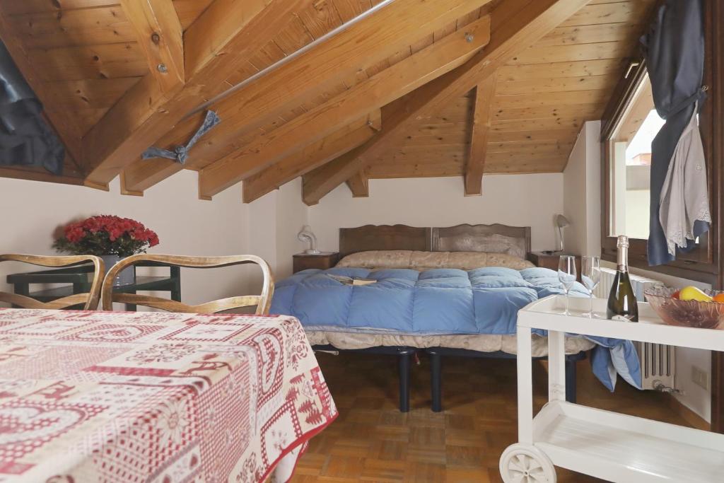 Łóżko lub łóżka w pokoju w obiekcie B&B Apartment La Gioconda