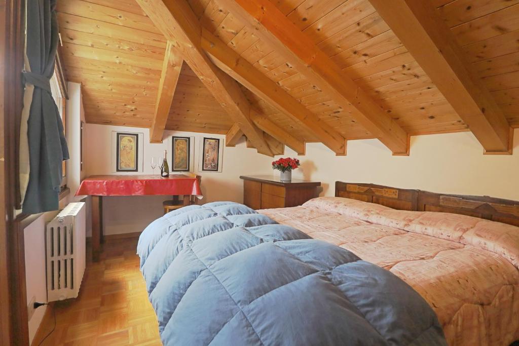 Łóżko lub łóżka w pokoju w obiekcie B&B Apartment La Gioconda