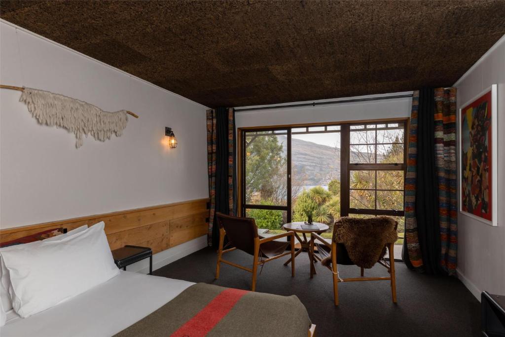 Postel nebo postele na pokoji v ubytování Sherwood Queenstown