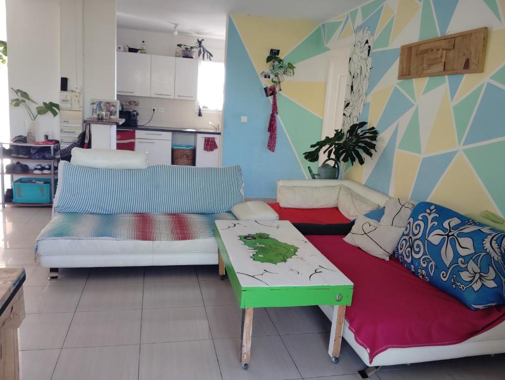 Posezení v ubytování La chambre Ganesh