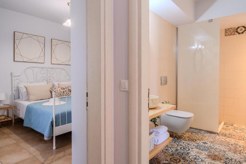 Postel nebo postele na pokoji v ubytování Manoir Dennise Villa