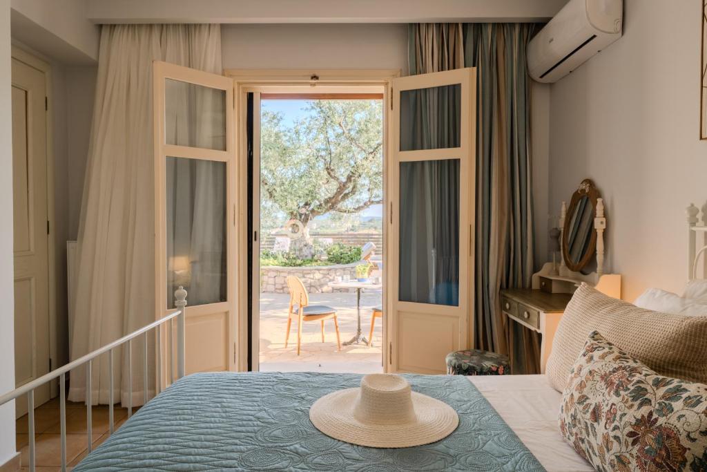 Postel nebo postele na pokoji v ubytování Manoir Dennise Villa