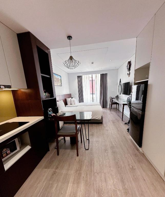 Kuchyň nebo kuchyňský kout v ubytování A25 Hotel - 18 Nguyễn Hy Quang