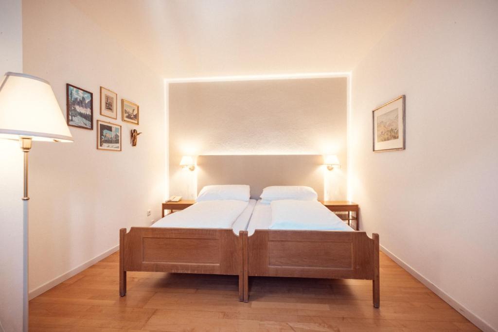 Postel nebo postele na pokoji v ubytování Hotel Rose Wenzer