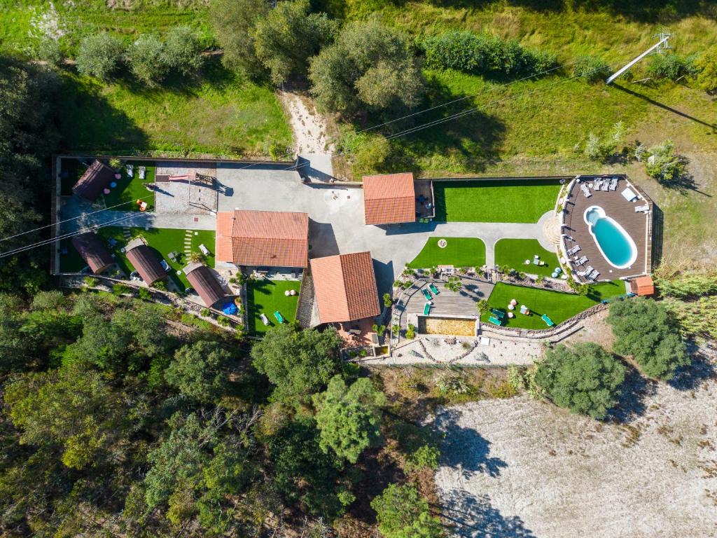 an overhead view of a yard with a pool at Rural Natura in Leiria