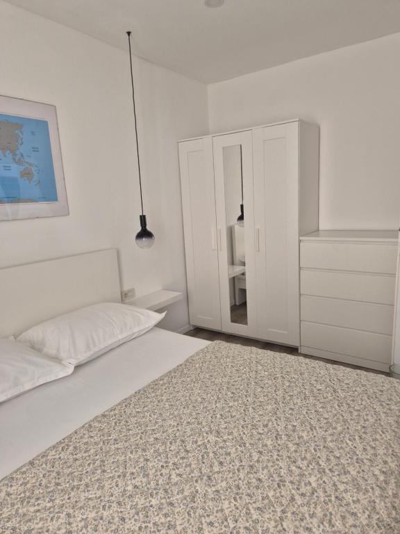 Postel nebo postele na pokoji v ubytování La La Lalic house