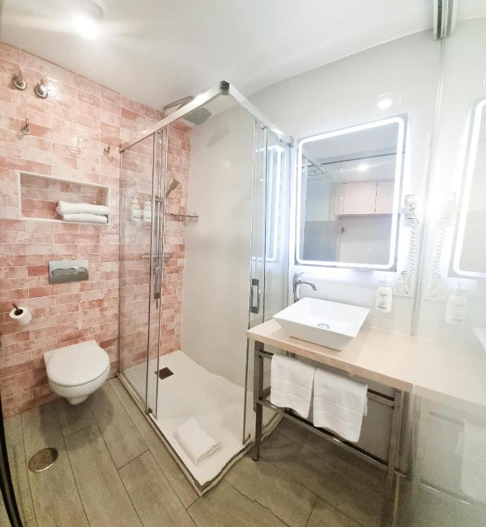 Koupelna v ubytování Hotel Clopy Rocamar