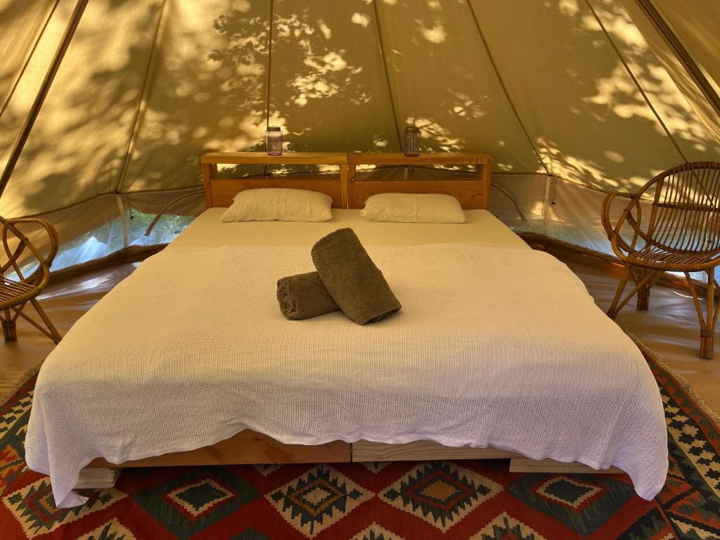 Postel nebo postele na pokoji v ubytování Eco-immersion