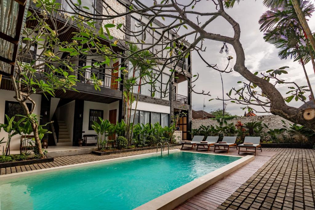 Πισίνα στο ή κοντά στο Sebelas Apartments by EVDEkimi - The Residence with Authentic Cafe in Ubud Center - Long stay extras