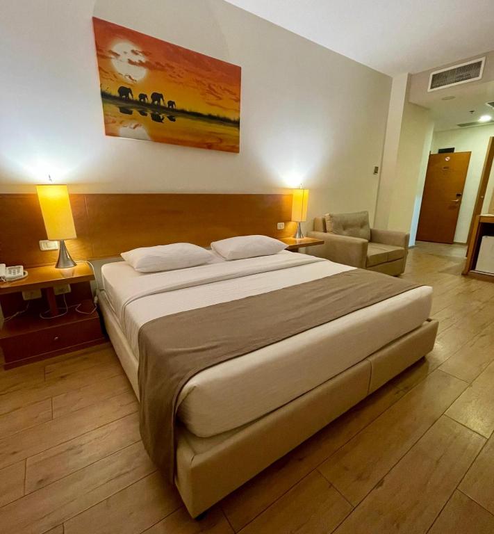 Postel nebo postele na pokoji v ubytování Caesar Hotel Ramallah