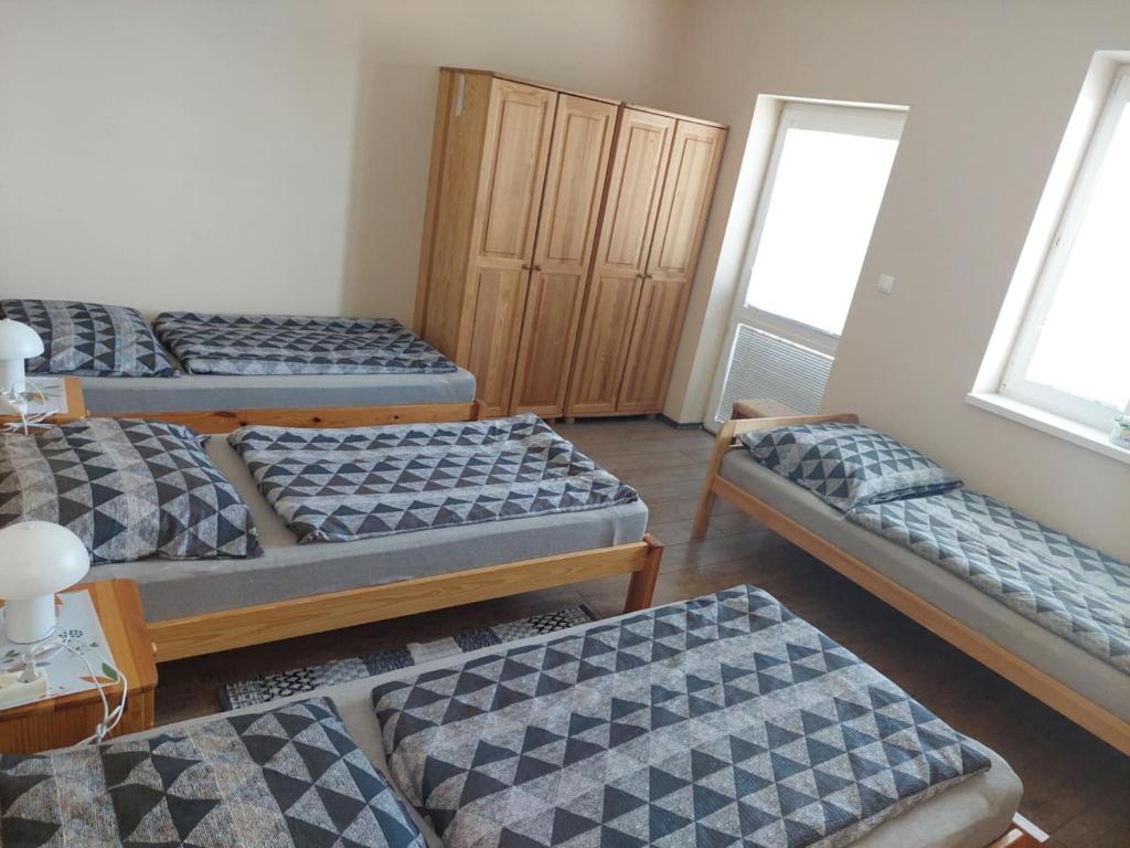 Postel nebo postele na pokoji v ubytování Ubytovňa Jázmin Vendégház