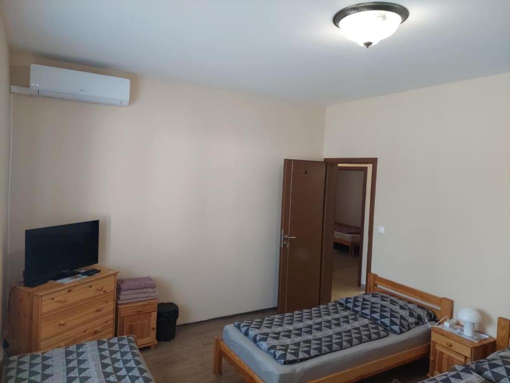 Postel nebo postele na pokoji v ubytování Ubytovňa Jázmin Vendégház