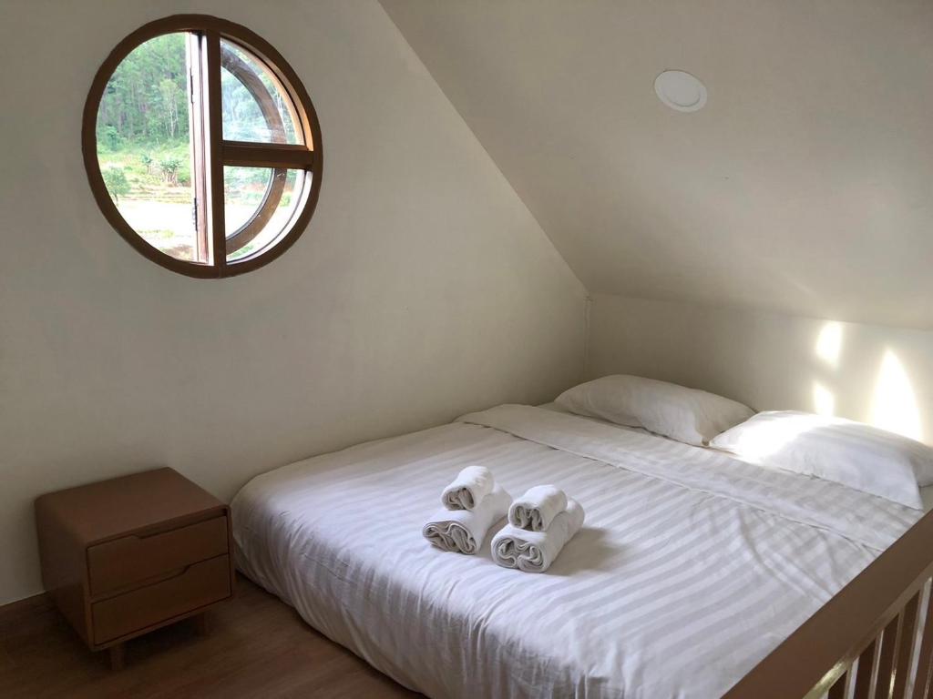 Postel nebo postele na pokoji v ubytování WC Coffee&ไร่หวานซึ้ง