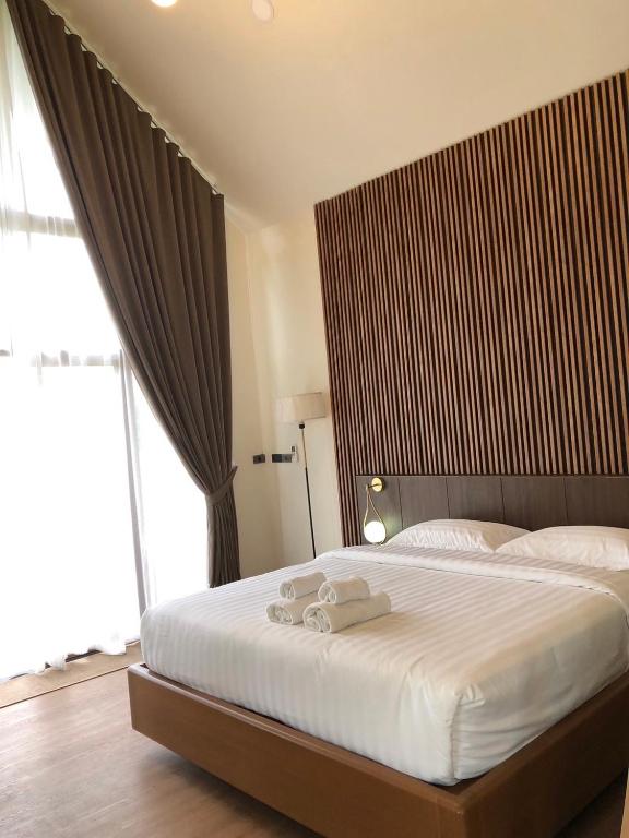 Postel nebo postele na pokoji v ubytování WC Coffee&ไร่หวานซึ้ง