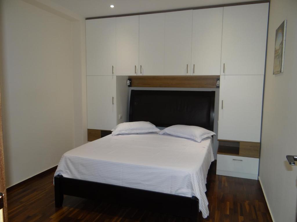 Postel nebo postele na pokoji v ubytování Sky Hotel