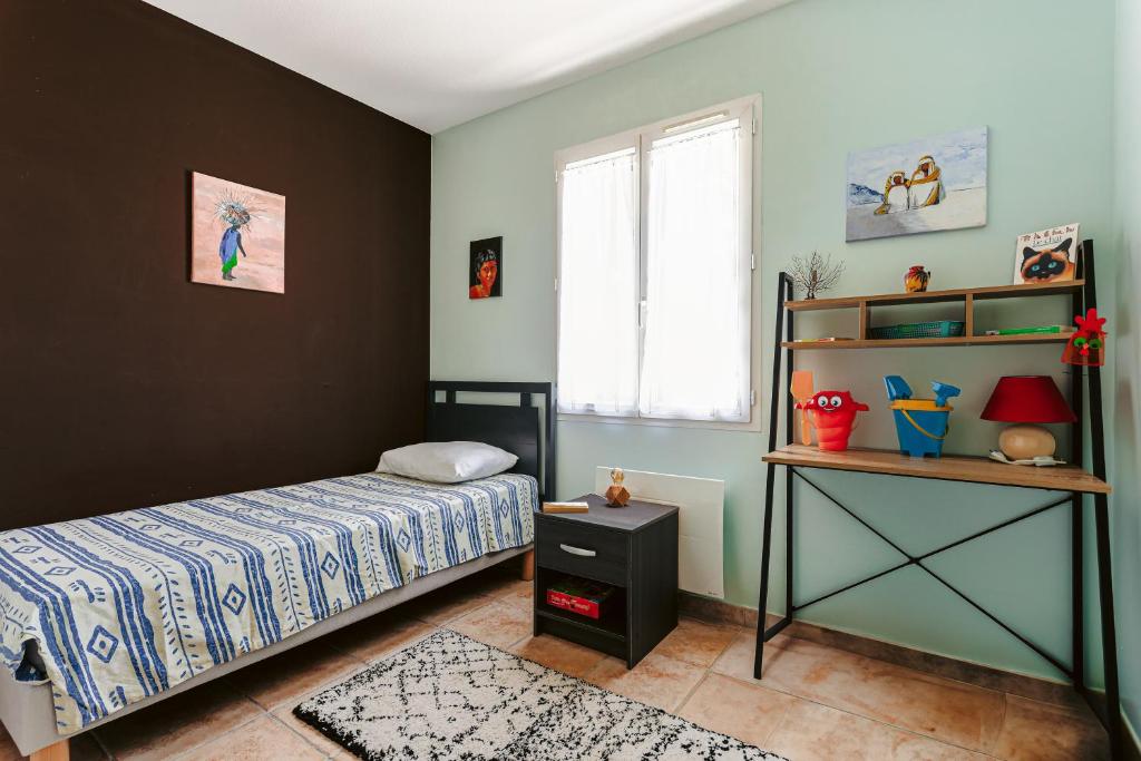 Postel nebo postele na pokoji v ubytování Maison conviviale près du Chateau