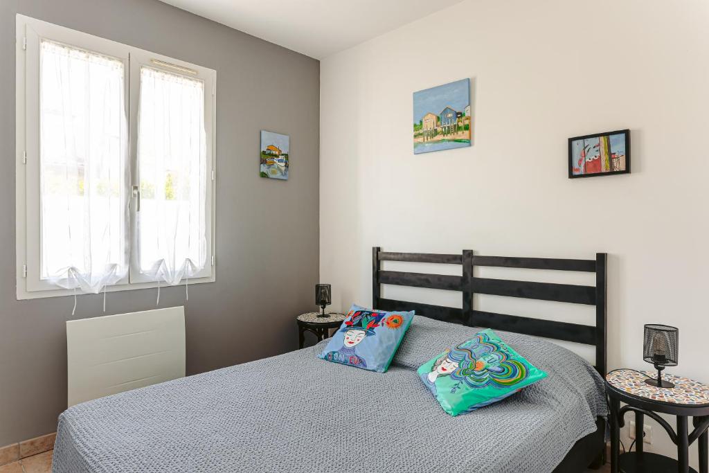 Postel nebo postele na pokoji v ubytování Maison conviviale près du Chateau