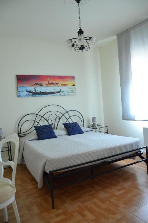 Postel nebo postele na pokoji v ubytování Ca' Nadia