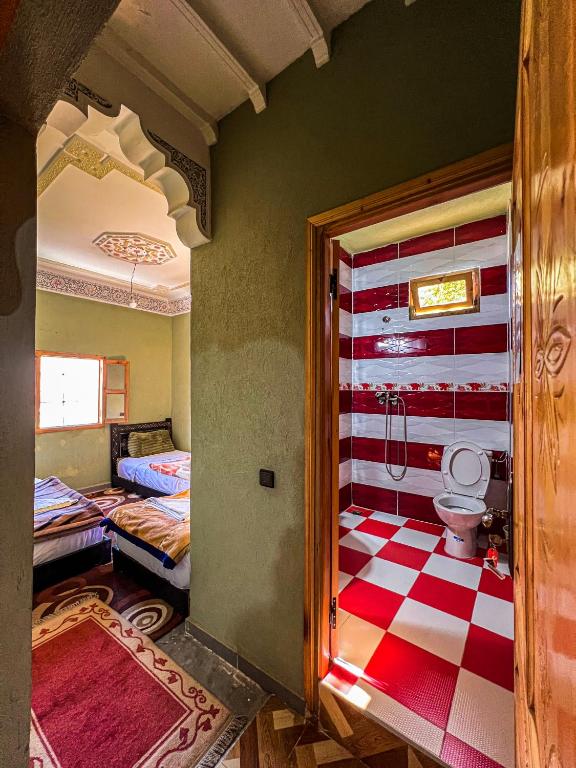 Postel nebo postele na pokoji v ubytování Dar Akiode Toubkal