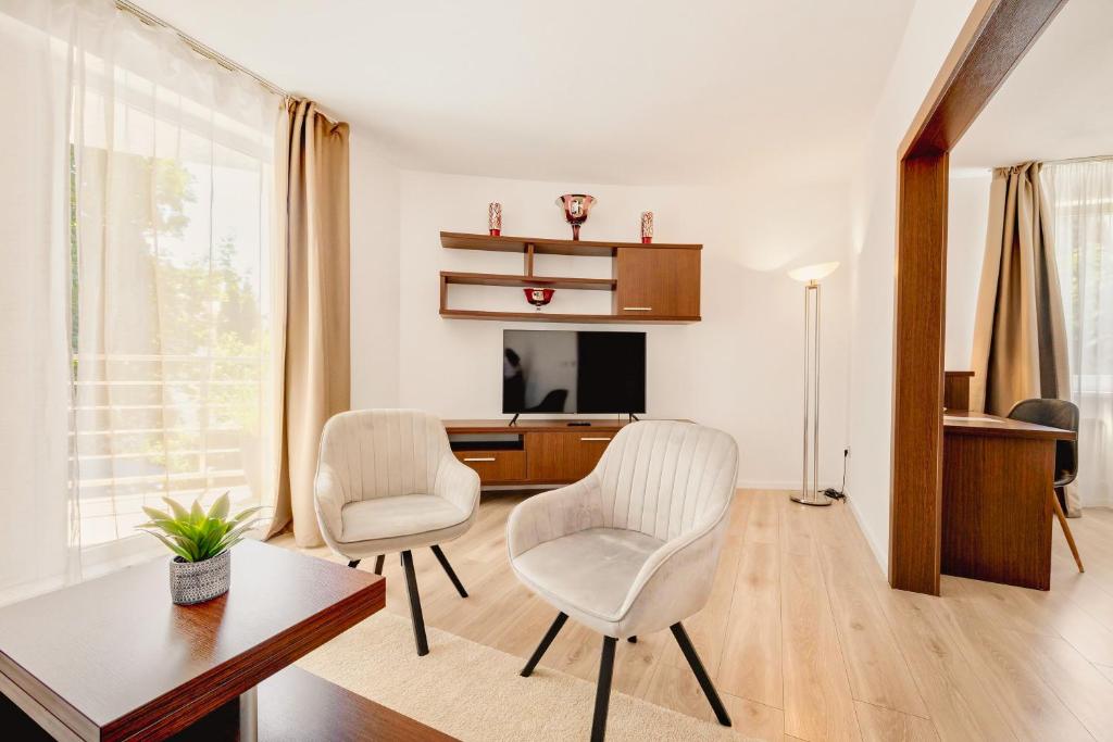 TV a/nebo společenská místnost v ubytování Hotel ANTARES