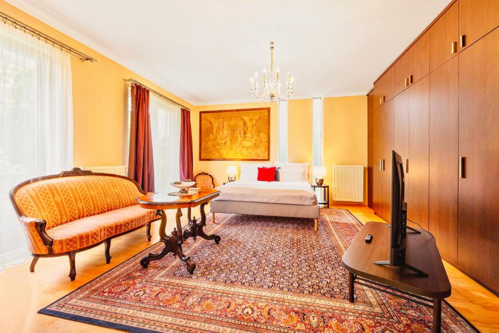 TV a/nebo společenská místnost v ubytování Hotel ANTARES