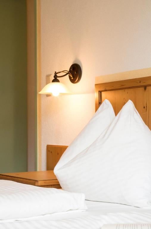 Posteľ alebo postele v izbe v ubytovaní Fliana Arlberg Studios & Aprtments