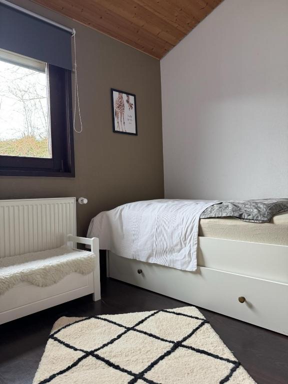 Postel nebo postele na pokoji v ubytování Sauerländer Henne-Lütt