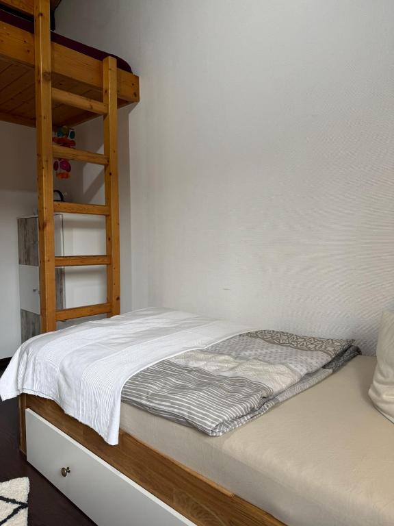Postel nebo postele na pokoji v ubytování Sauerländer Henne-Lütt