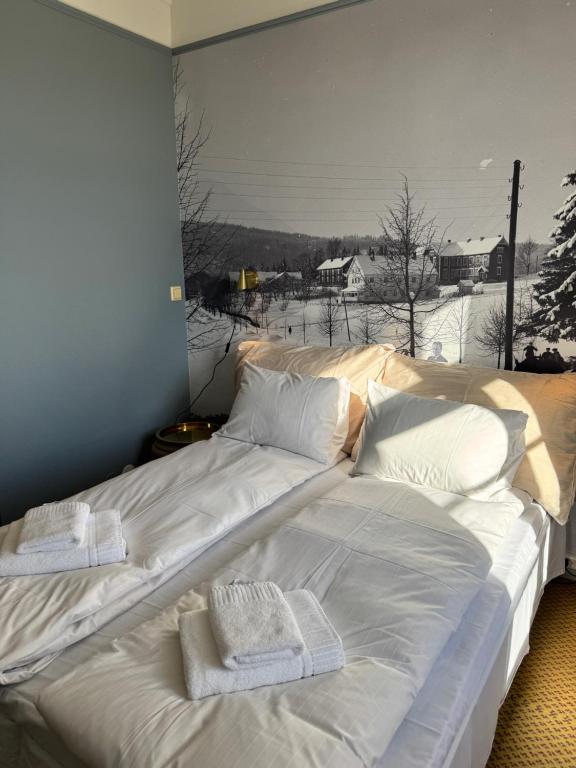 Postel nebo postele na pokoji v ubytování Øvre Sem Gård