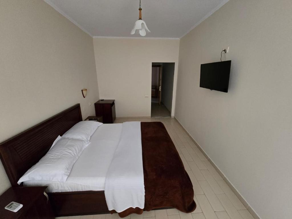 Postel nebo postele na pokoji v ubytování Hotel Belvedere
