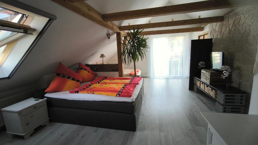 Ένα ή περισσότερα κρεβάτια σε δωμάτιο στο Ferienwohnung Traumblick