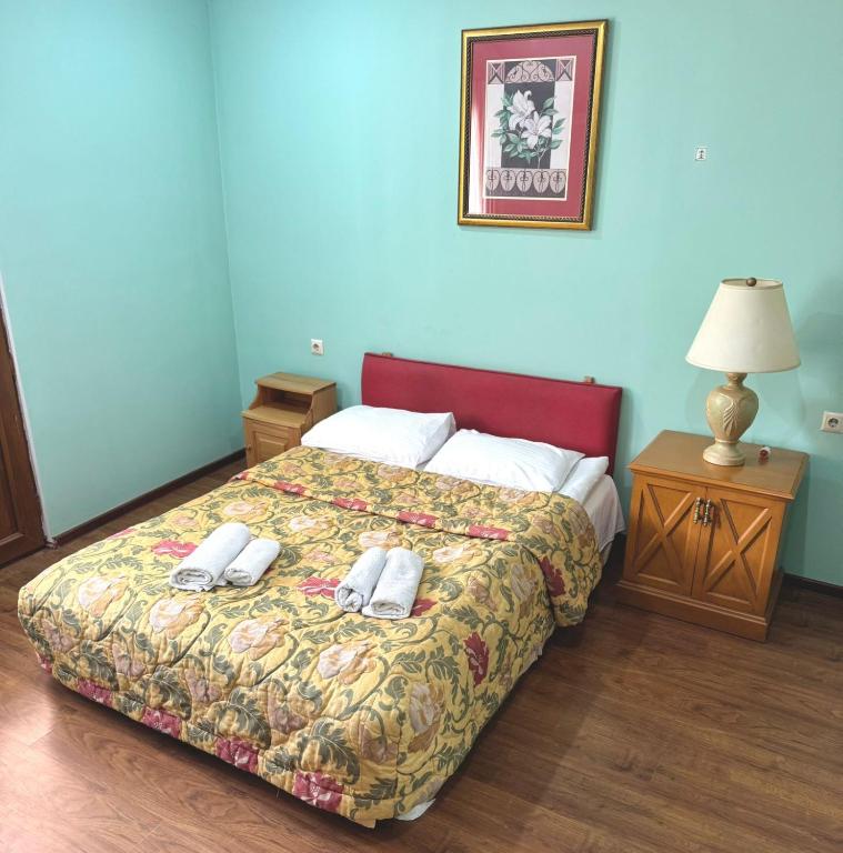 Postel nebo postele na pokoji v ubytování Hotel Lileo