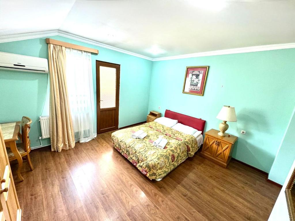 Postel nebo postele na pokoji v ubytování Hotel Lileo