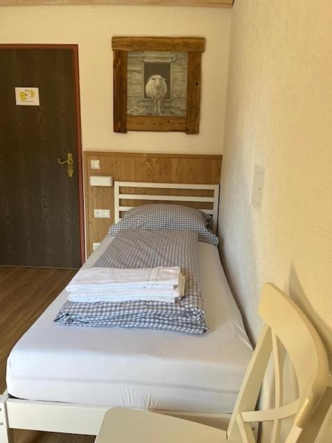 Postel nebo postele na pokoji v ubytování B&B in Seefeld