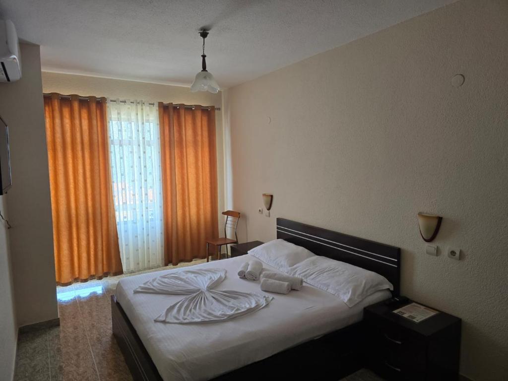 Postel nebo postele na pokoji v ubytování Hotel Belvedere