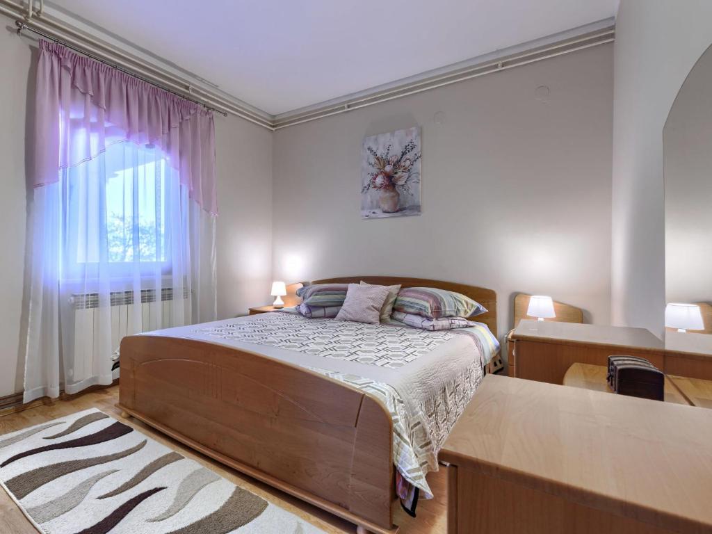 Posteľ alebo postele v izbe v ubytovaní Apartment Cekić-2 by Interhome