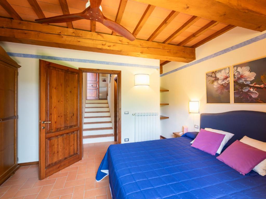 A bed or beds in a room at Holiday Home La Torre by Interhome