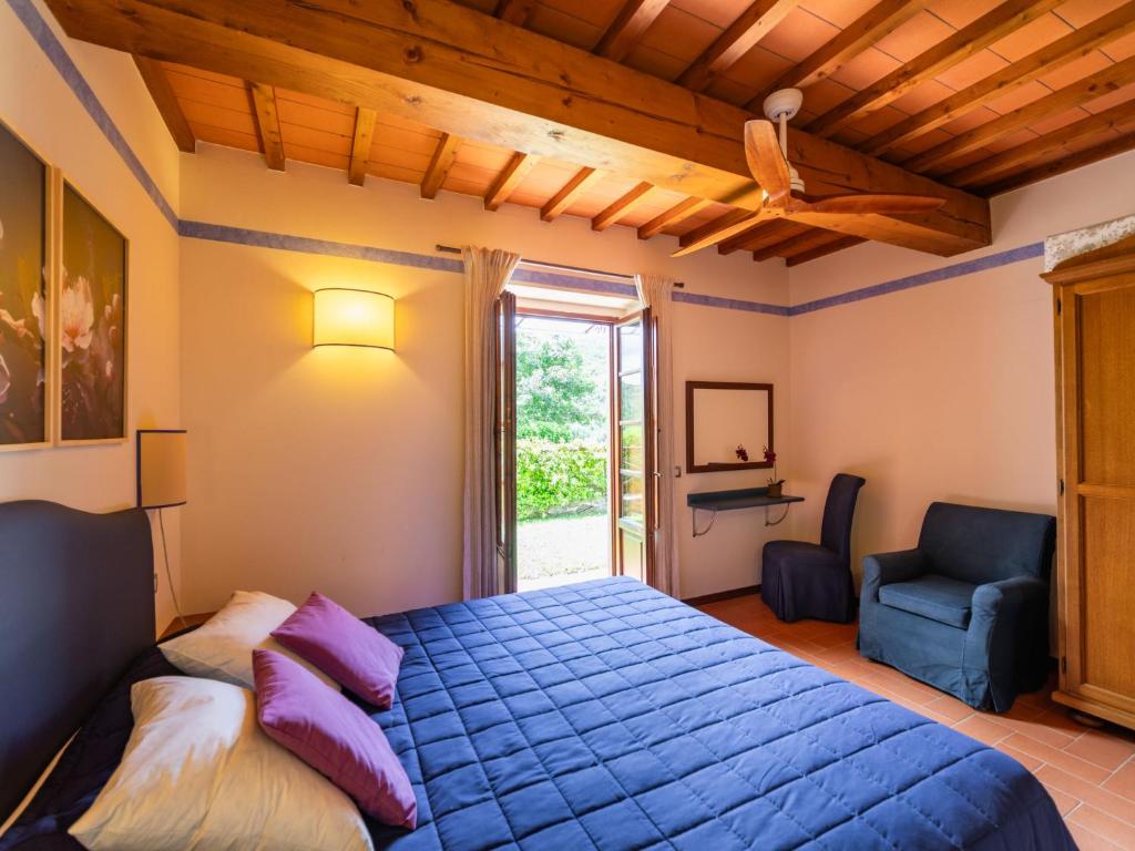 A bed or beds in a room at Holiday Home La Torre by Interhome